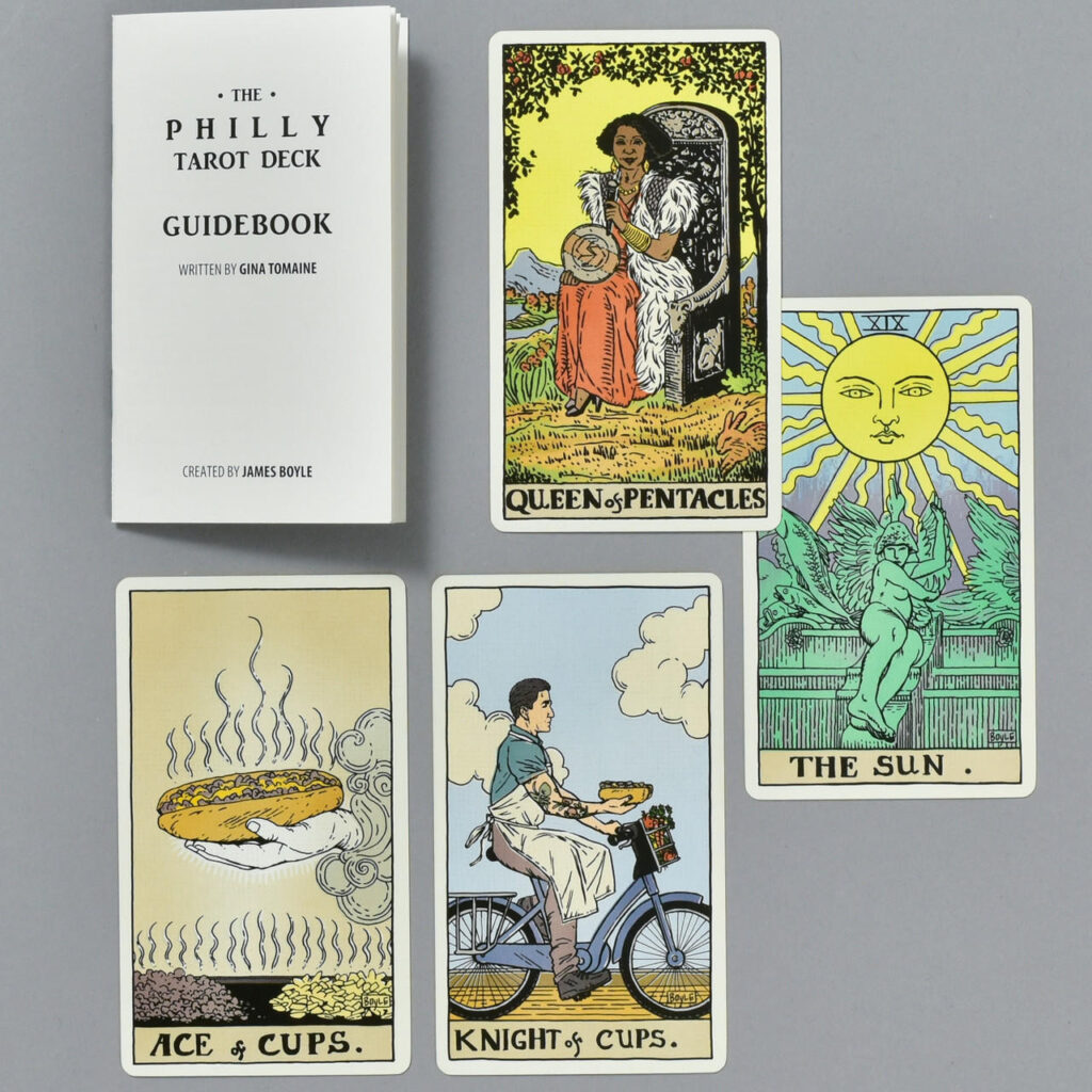 Tarot cards arranged on a grey background