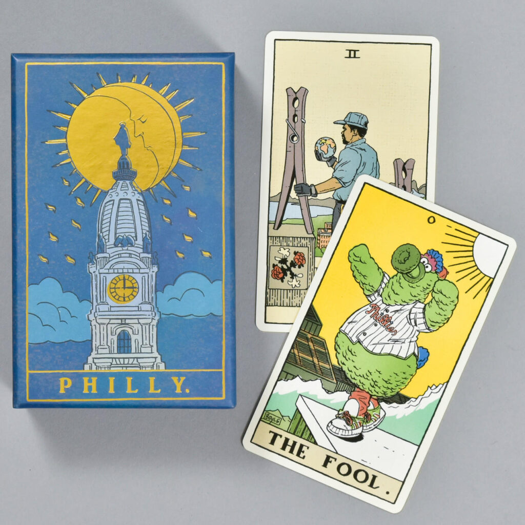 Tarot cards arranged on a grey background